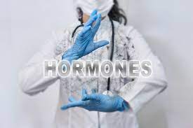 medical pro holding hormone sign