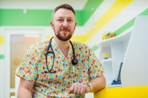 doctor wearing wild shirt 300x200