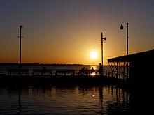 A sunset across a lake.