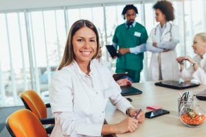 smiling receptionist at hormone clinic 300x200