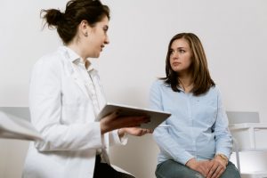 female doctor explaining the therapy to her patient