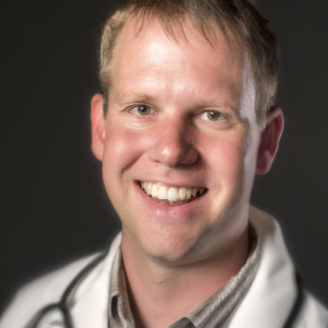 a professional and visually appealing image of a young happy smiling caucasian doctor with white teeth 592 300x300
